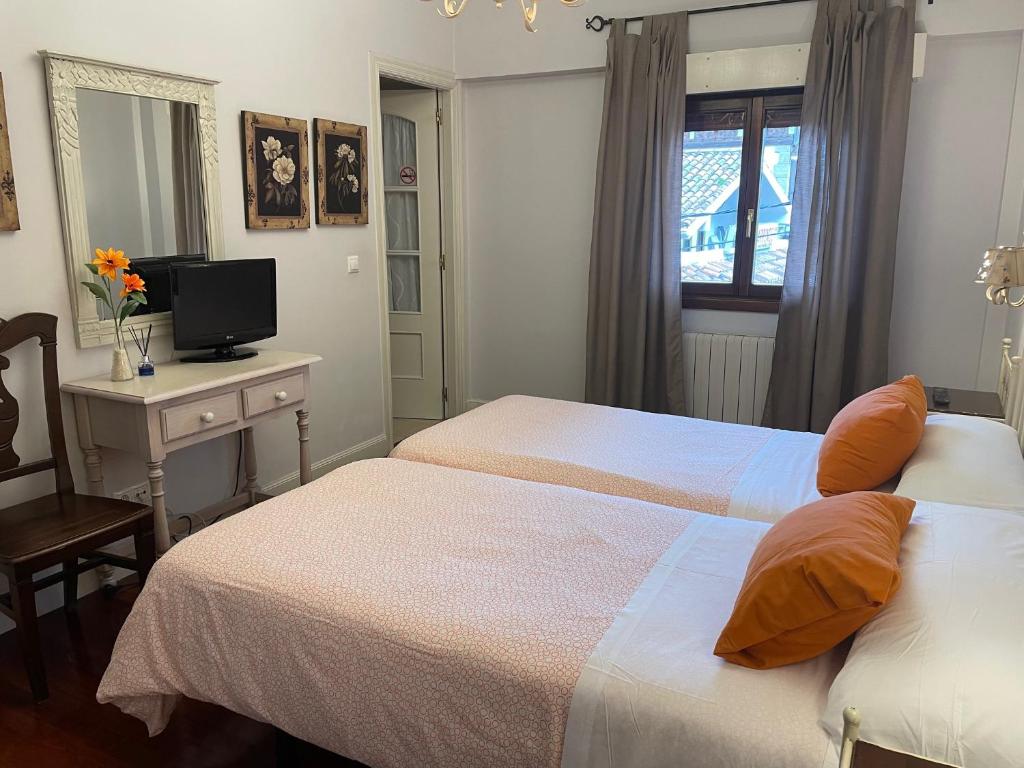 Postel nebo postele na pokoji v ubytování Hotel Kaia
