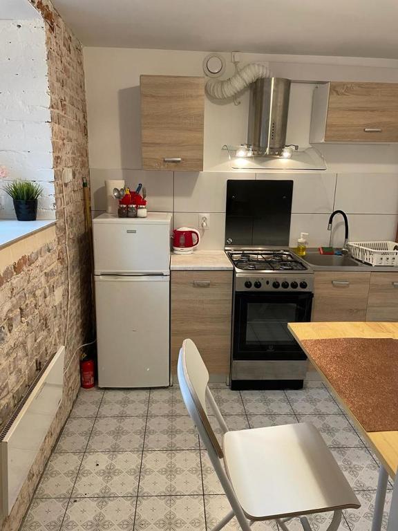 Kuchyňa alebo kuchynka v ubytovaní Apartment Konopnickiej - PARKING FREE