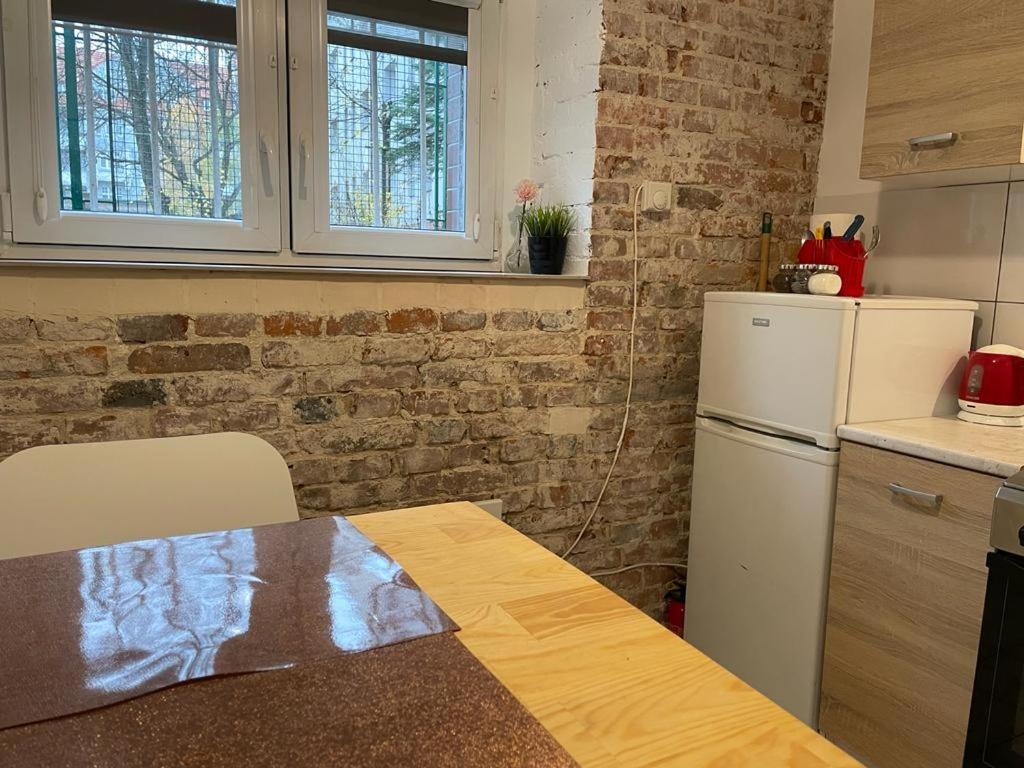 Kuchyňa alebo kuchynka v ubytovaní Apartment Konopnickiej - PARKING FREE