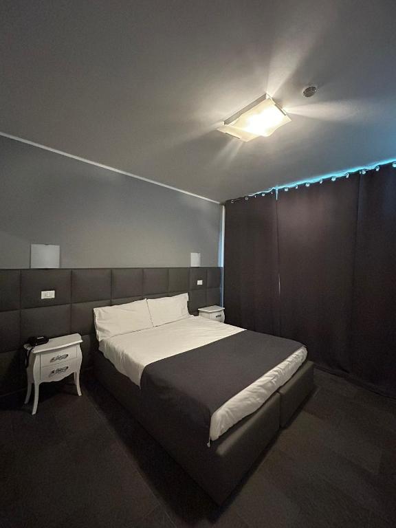 Postel nebo postele na pokoji v ubytování Hotel Noventa