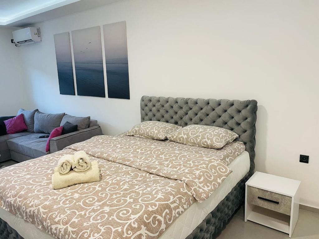 Postel nebo postele na pokoji v ubytování Luxury Centar 2