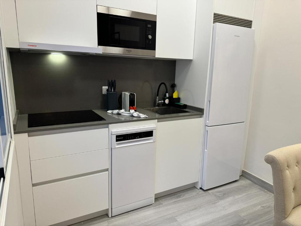 Kuchyň nebo kuchyňský kout v ubytování Dream Maday