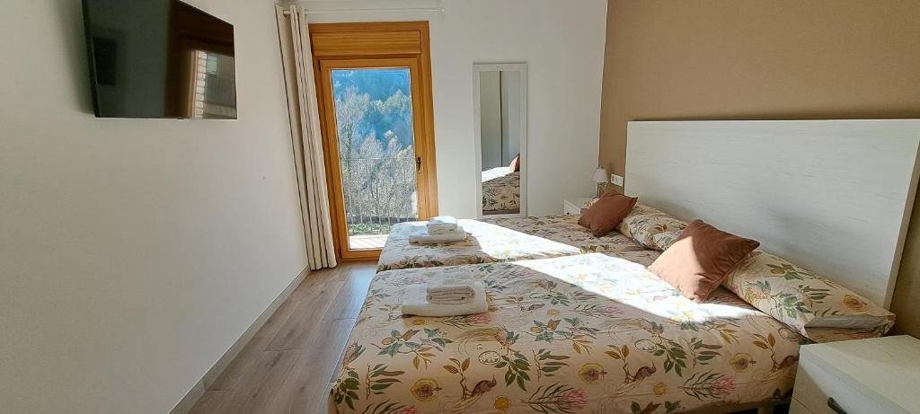 Postel nebo postele na pokoji v ubytování Cal Bardillo