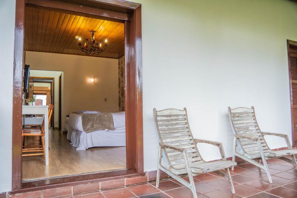 Postel nebo postele na pokoji v ubytování Hotel Ascona