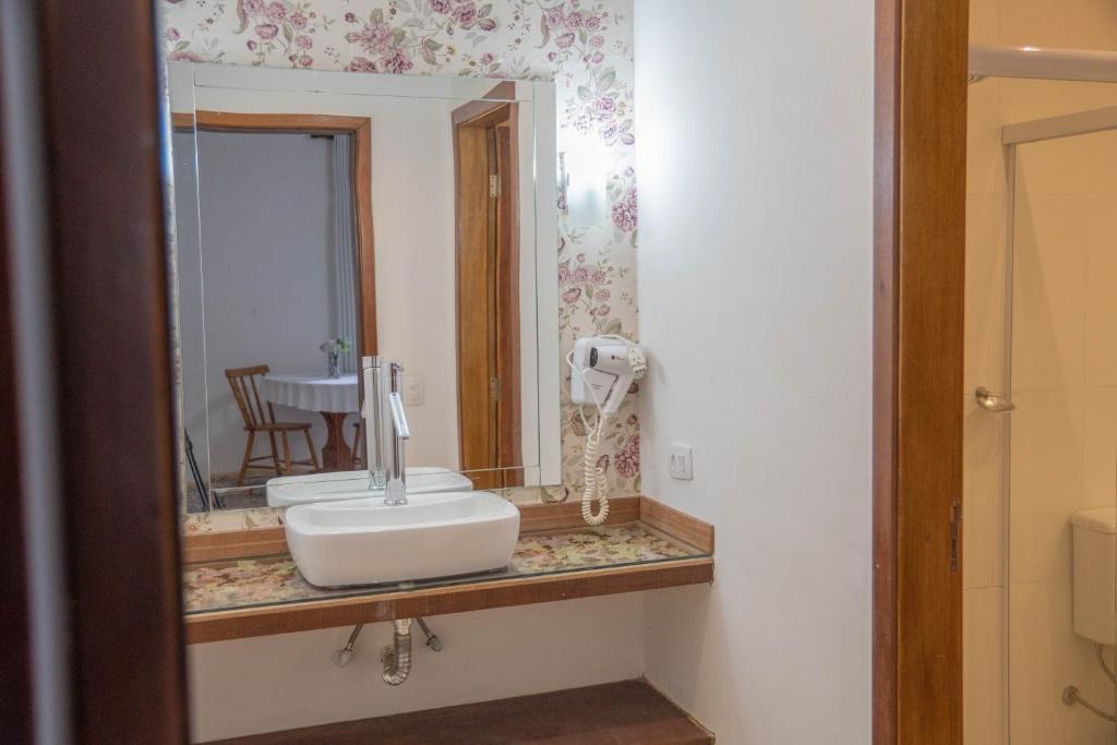Koupelna v ubytování Hotel Ascona