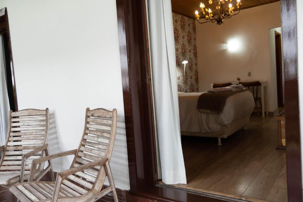 Postel nebo postele na pokoji v ubytování Hotel Ascona