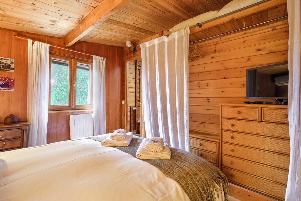 Postel nebo postele na pokoji v ubytování La Cabaña