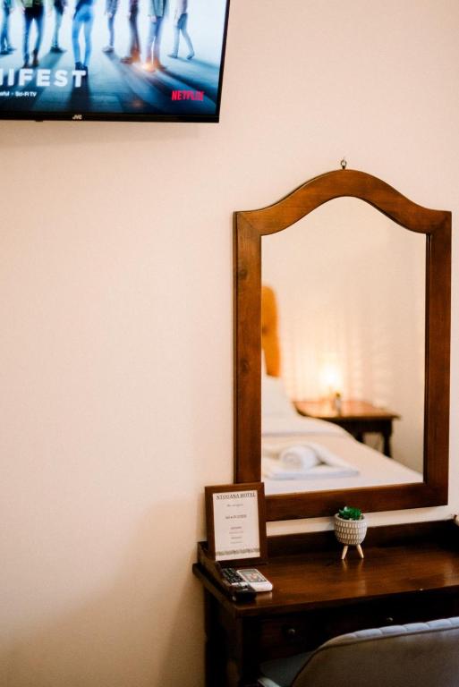 Voodi või voodid majutusasutuse Ntouana hotel toas