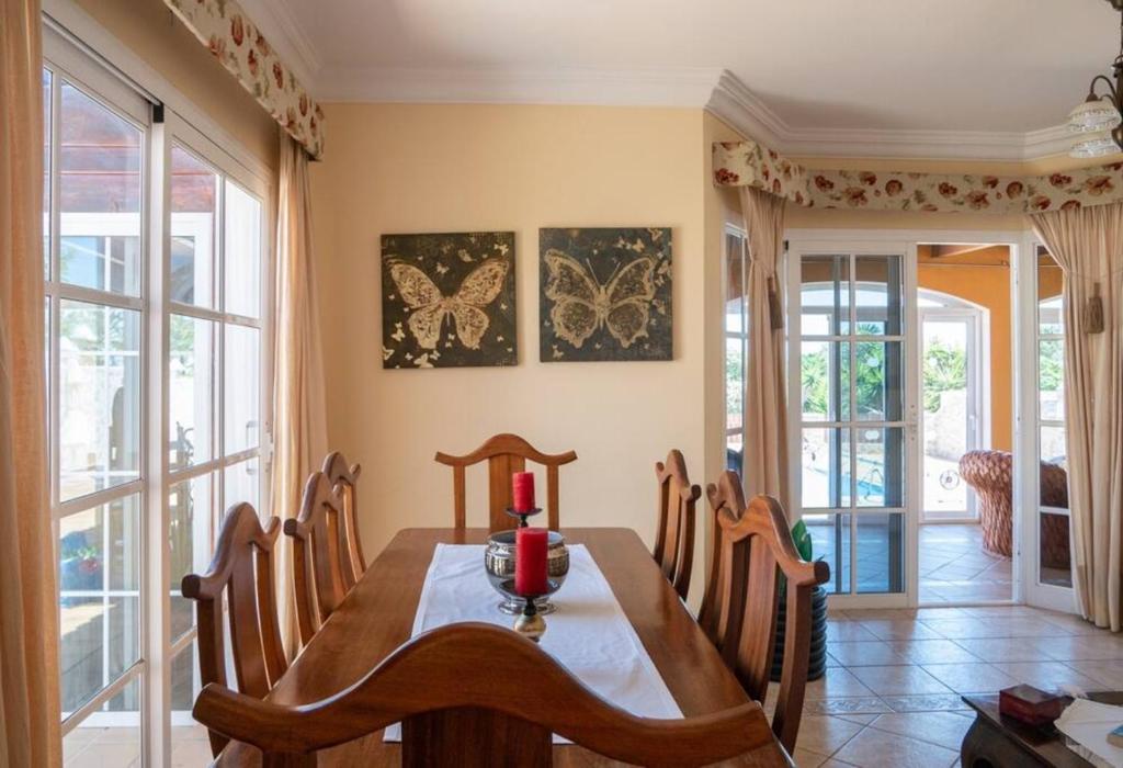 A seating area at Holiday Villa Vergel with Huge Private Pool, Jacuzzi, Sauna & BBQ by Amazzzing Travel