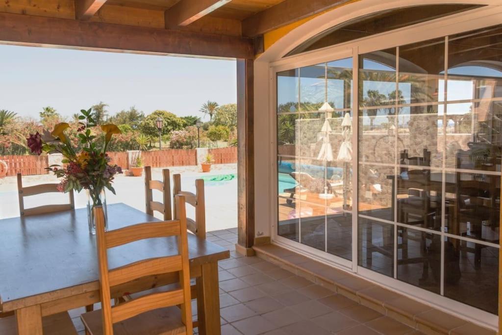 A balcony or terrace at Holiday Villa Vergel with Huge Private Pool, Jacuzzi, Sauna & BBQ by Amazzzing Travel