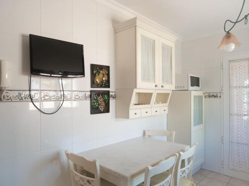 A kitchen or kitchenette at Holiday Villa Vergel with Huge Private Pool, Jacuzzi, Sauna & BBQ by Amazzzing Travel