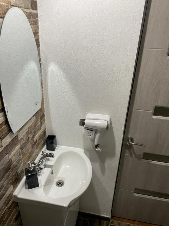 Koupelna v ubytování Casa Ella Maldaresti