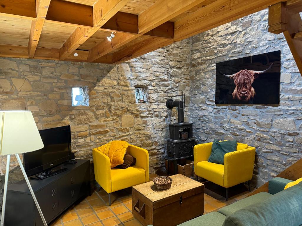 Posezení v ubytování Gîte Le fournil