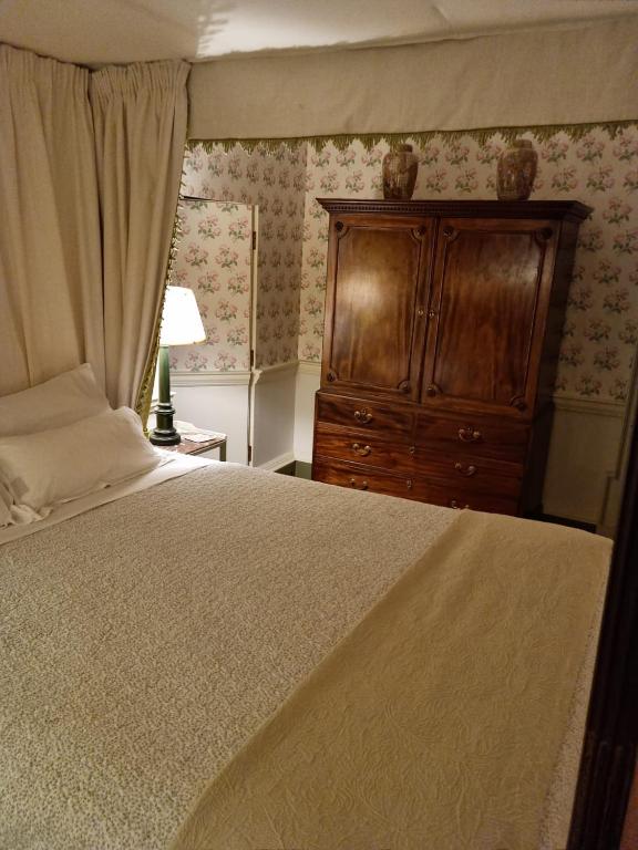 Postel nebo postele na pokoji v ubytování Summergrove House