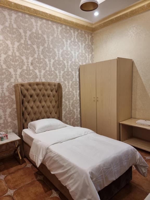 Postel nebo postele na pokoji v ubytování Marhabaa hotel Al Amarat