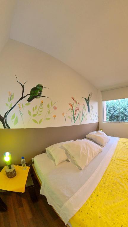 Postel nebo postele na pokoji v ubytování Casa Boutique QX- Pachacamac
