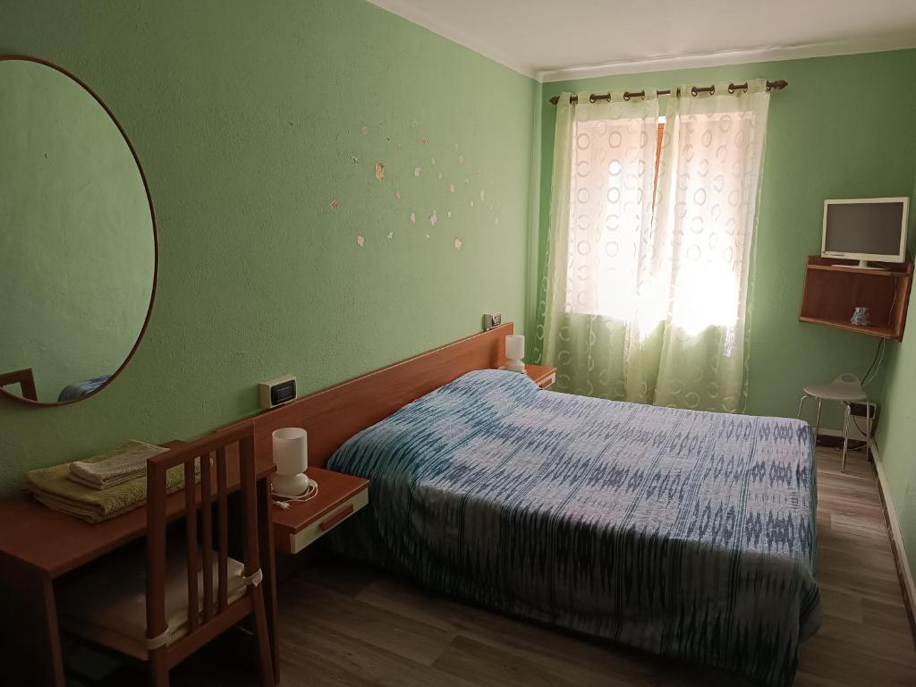 Postel nebo postele na pokoji v ubytování B&B La Stria del Re