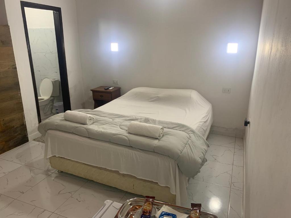 Cama o camas de una habitación en Las Salinas Hostal