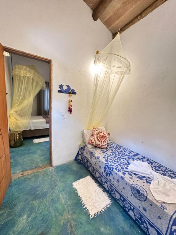 Postel nebo postele na pokoji v ubytování Gaia Eco Glamping - Instituto Almas Livres