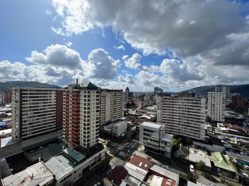 a view of a city with tall buildings at City House Andes Bello in Temuco