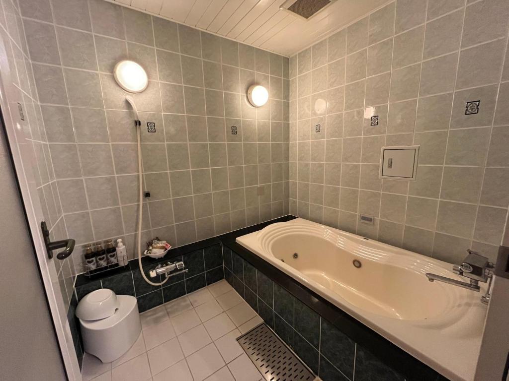Koupelna v ubytování 艶横浜町田店 adult only