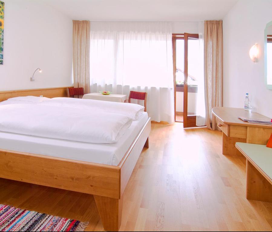 Postel nebo postele na pokoji v ubytování Bio Hotel Kaufmann