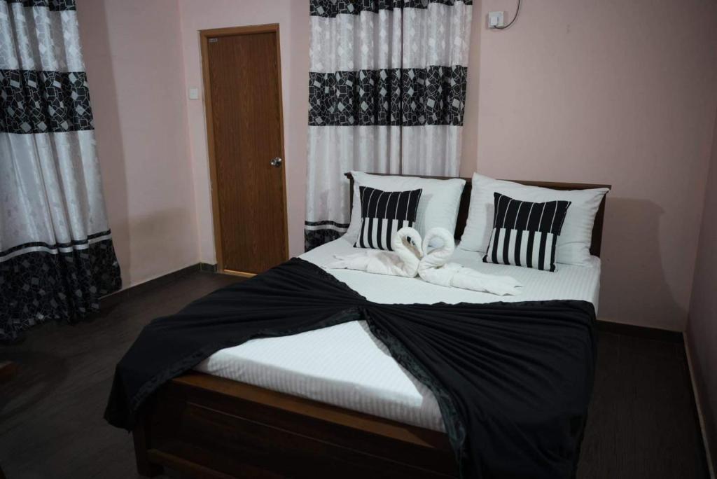 Postel nebo postele na pokoji v ubytování Airport Villa D 87