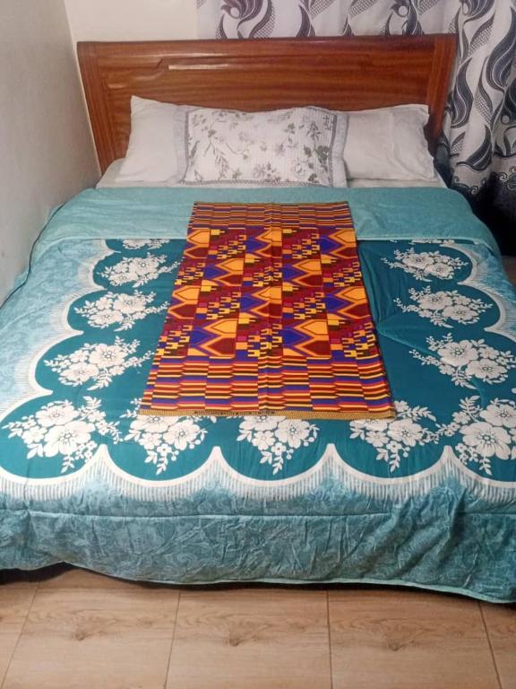 RusticHome B&B, Kigali - Chambre Reine