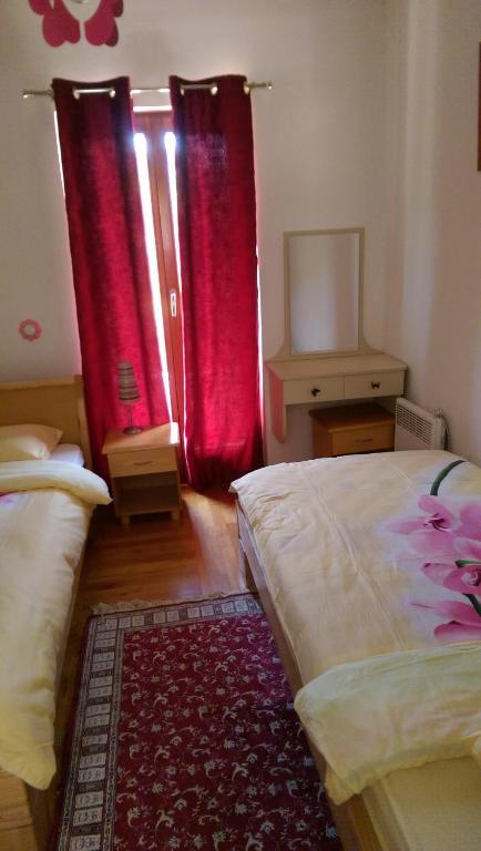 Postel nebo postele na pokoji v ubytování Holiday House Villa Neda