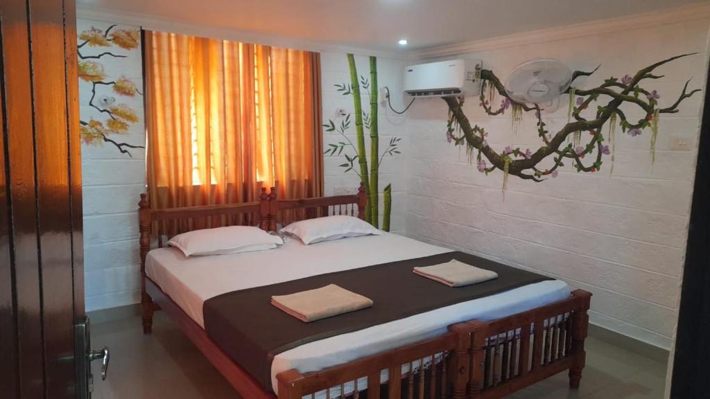 Postel nebo postele na pokoji v ubytování Samsara Harmony Beach Resort