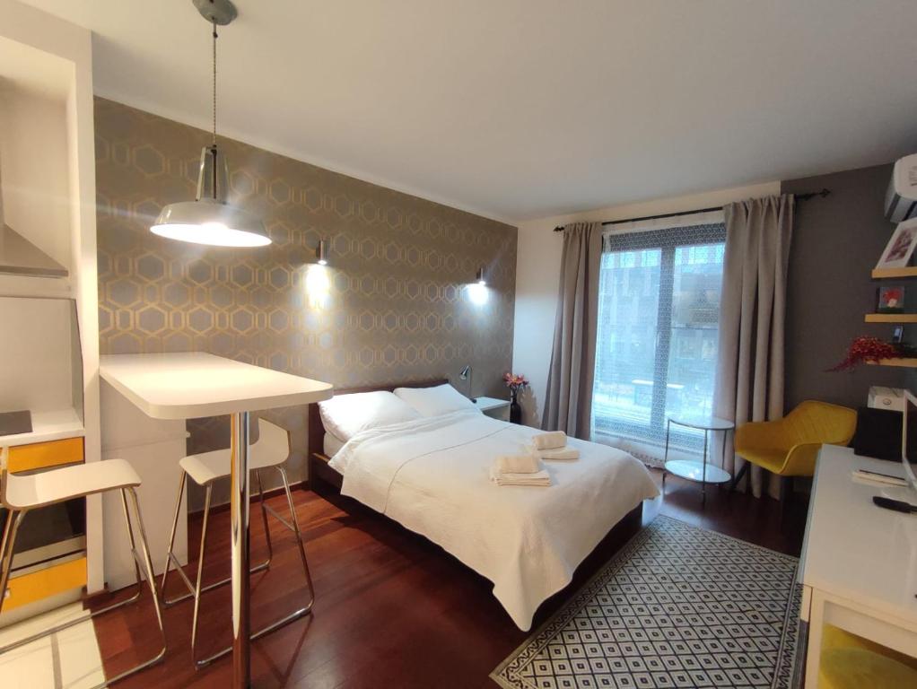 Posteľ alebo postele v izbe v ubytovaní JM Apartment Old Town Krakow