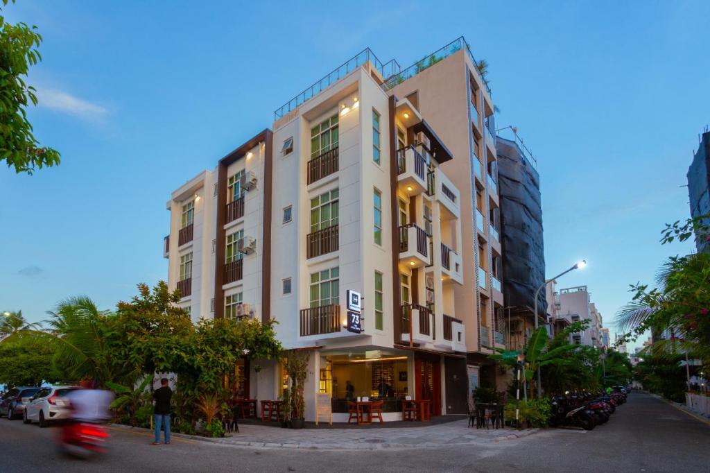 a building on the corner of a street at Express Inn at Hulhumale in Hulhumale