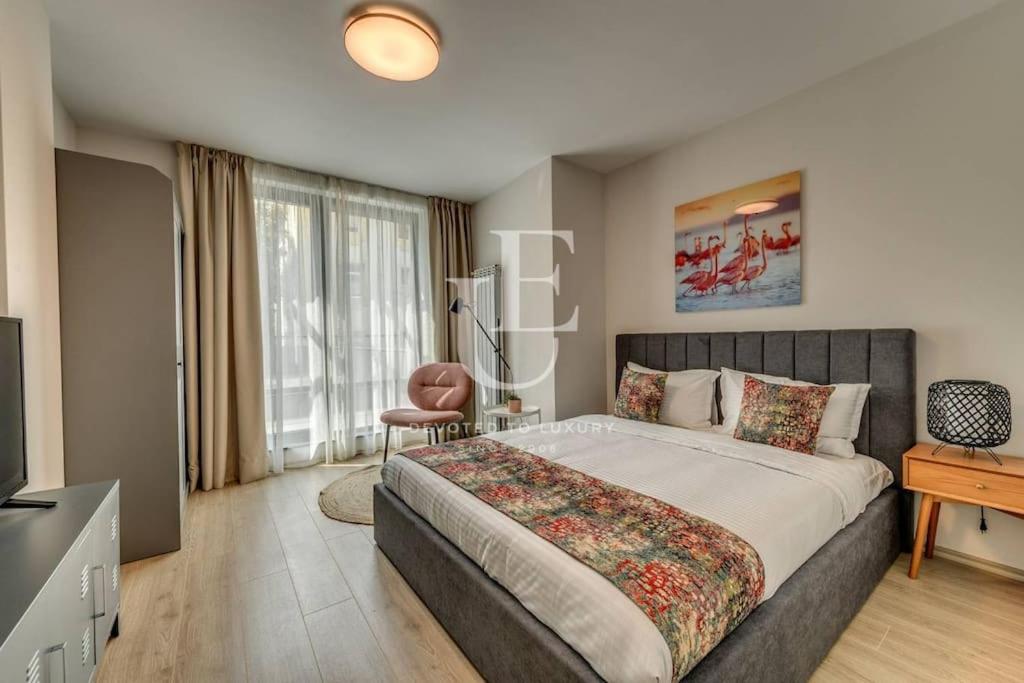 Postel nebo postele na pokoji v ubytování Oslo: A modern furnished apartment with parking