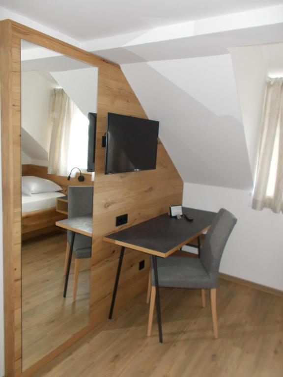 Postel nebo postele na pokoji v ubytování Gasthof Ramsauer