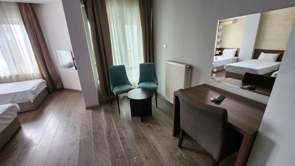 Voodi või voodid majutusasutuse Hotel Rile Men Blue toas