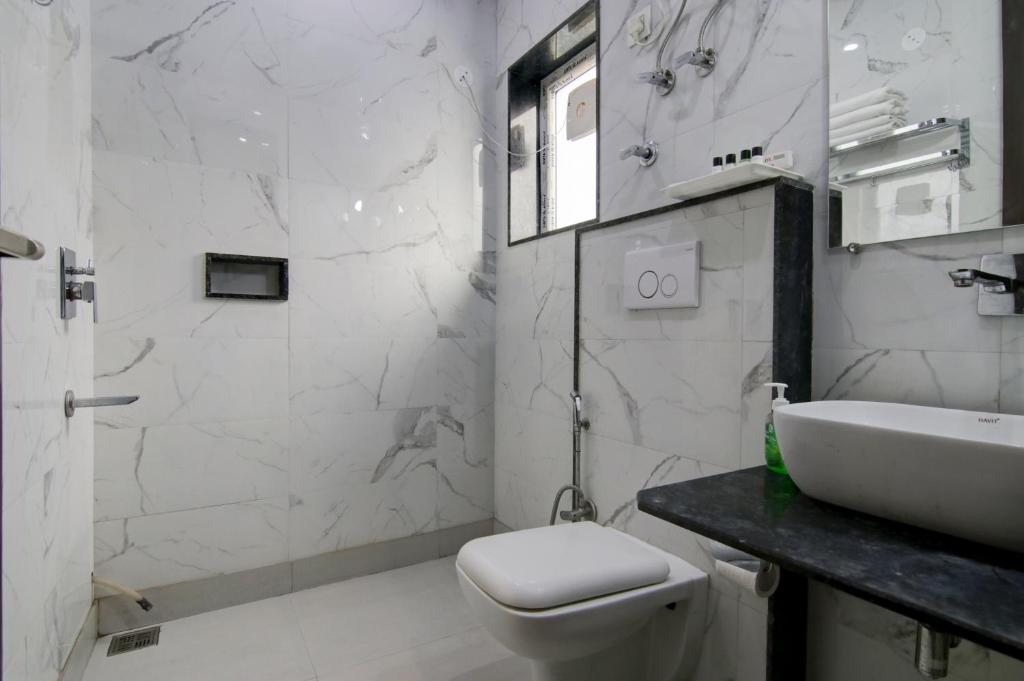 Koupelna v ubytování Hotel Good Will Residency - Cyber City Gurgaon