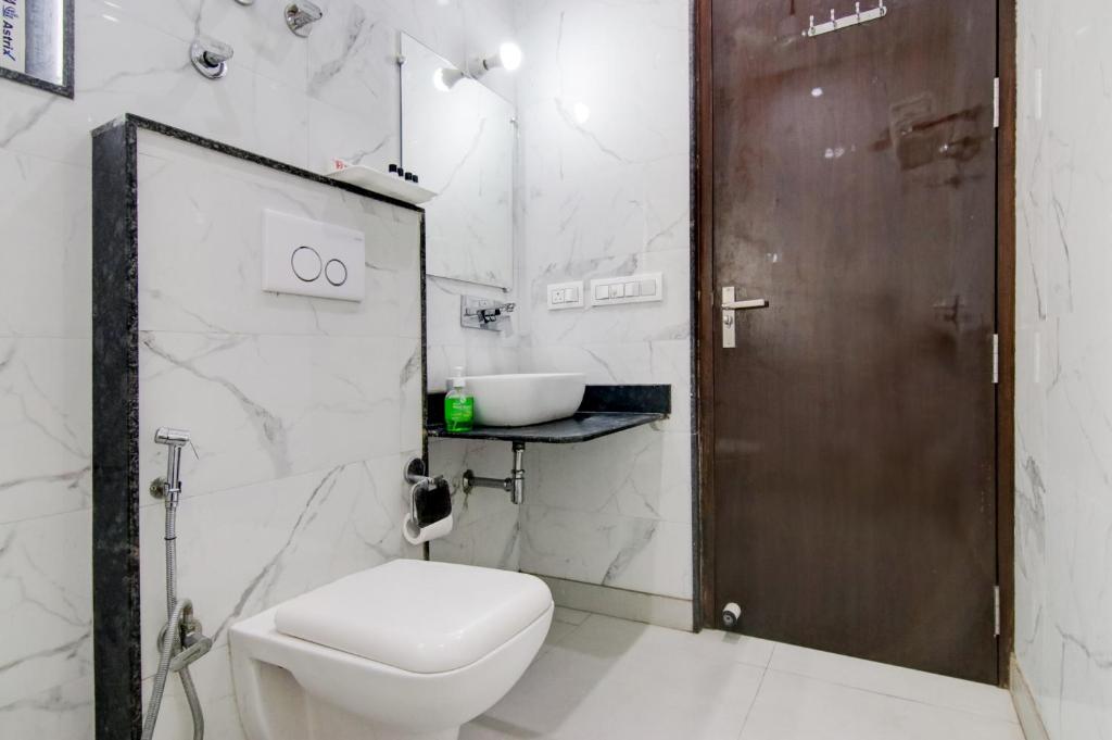 Koupelna v ubytování Hotel Good Will Residency - Cyber City Gurgaon
