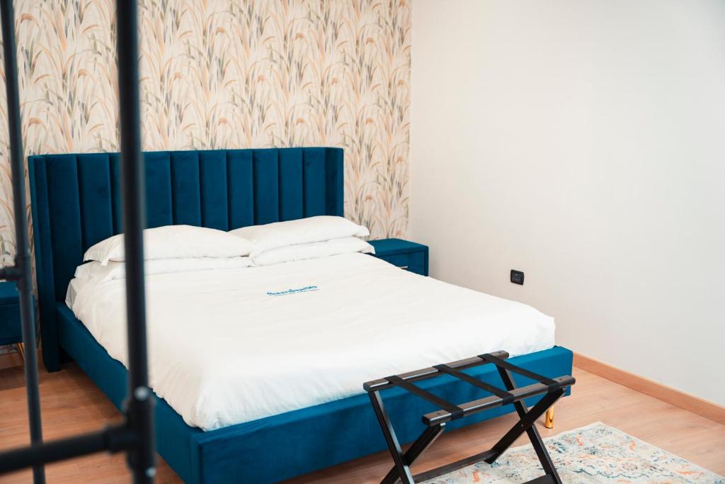 Postel nebo postele na pokoji v ubytování SambaSS Boutique Apartment