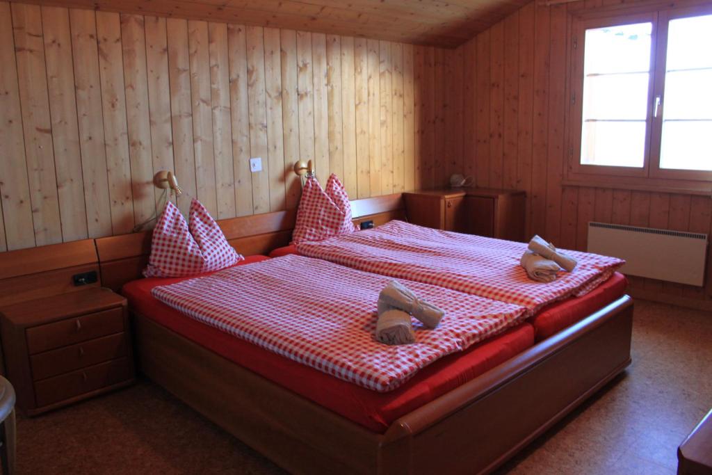 Postel nebo postele na pokoji v ubytování Chalet Sepp