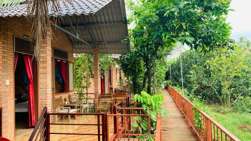 Gibbon Singing Home Stay - Habitación Cuádruple Con Vista Al Jardín