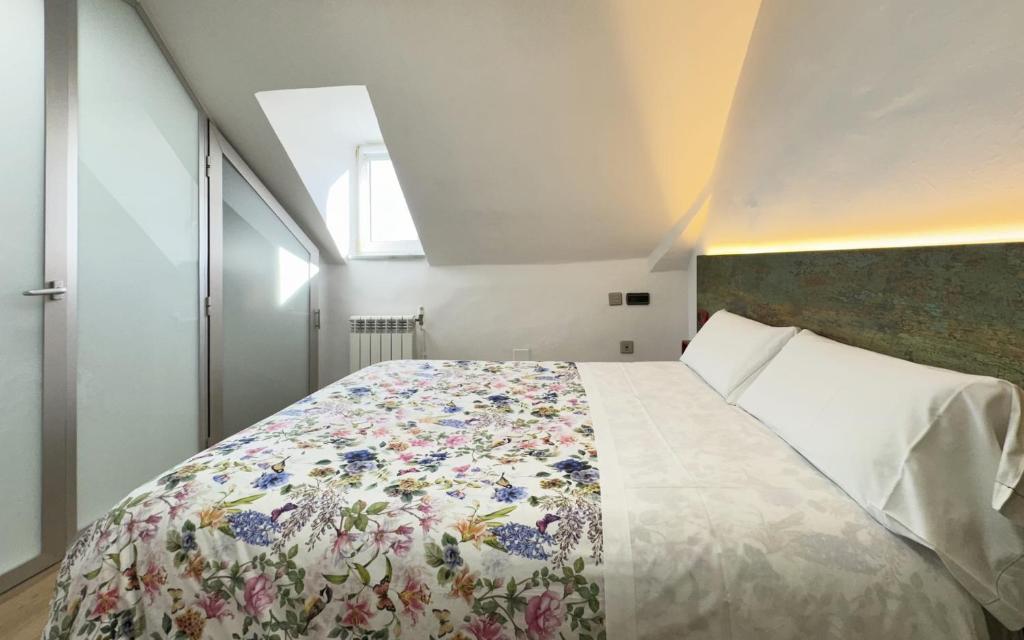 Łóżko lub łóżka w pokoju w obiekcie Posada Villa Rosa