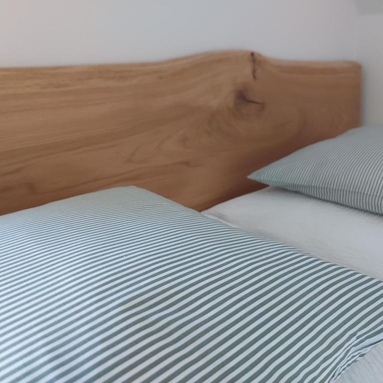 Postel nebo postele na pokoji v ubytování Apartmány Marie Albeř