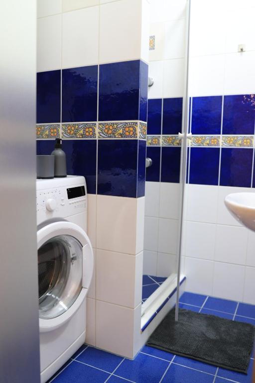 Koupelna v ubytování Apartmán U Parku
