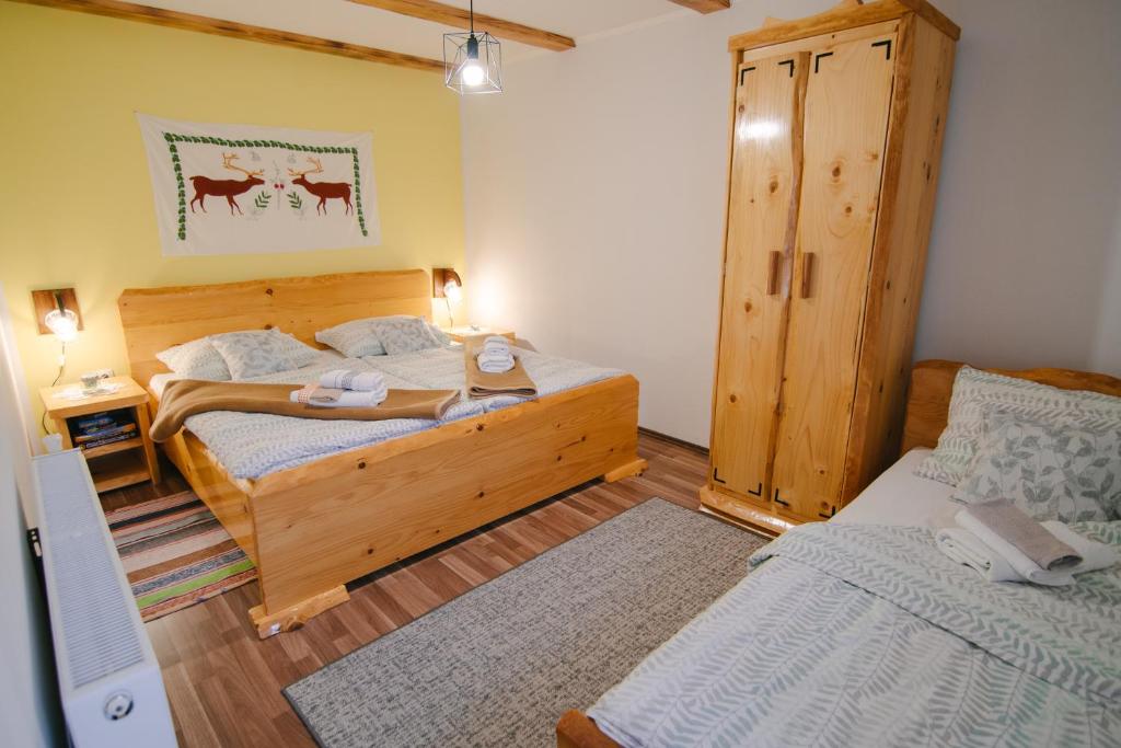 Tempat tidur dalam kamar di Kuća za odmor Ana
