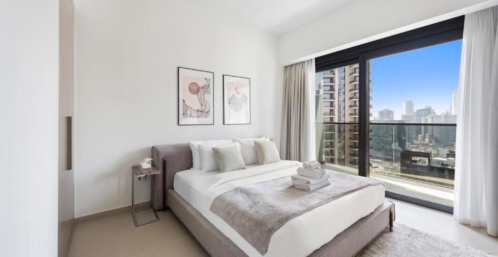 Postel nebo postele na pokoji v ubytování Exclusive 2BHK in Downtown Dubai