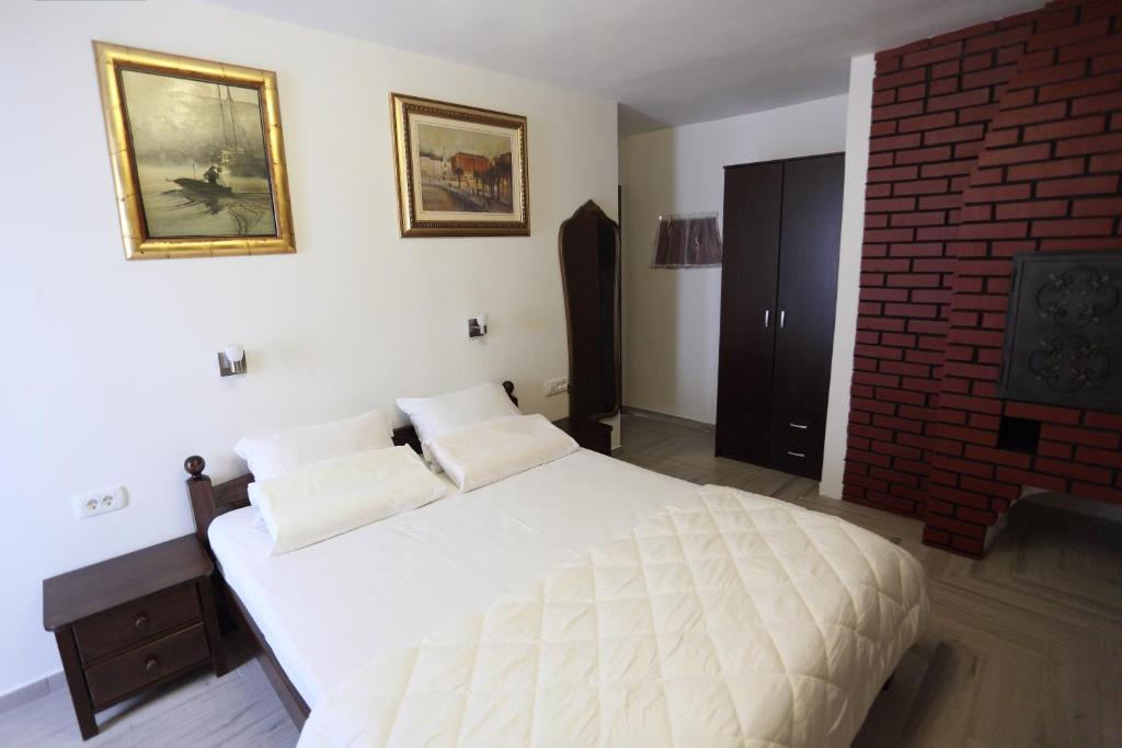 Postel nebo postele na pokoji v ubytování Golden Gate Dream Rooms