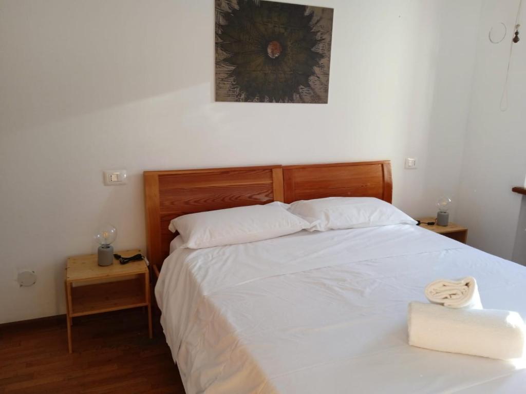 Postel nebo postele na pokoji v ubytování HOTEL BRUSTOLON