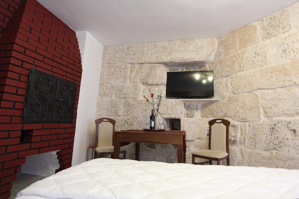 Postel nebo postele na pokoji v ubytování Golden Gate Dream Rooms