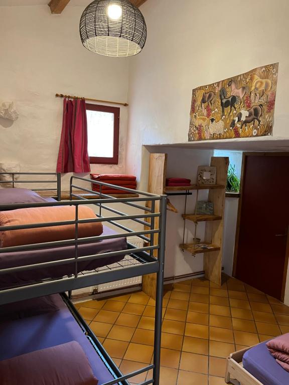 Postel nebo postele na pokoji v ubytování Chambres d'hôtes Gîte Saint Roch