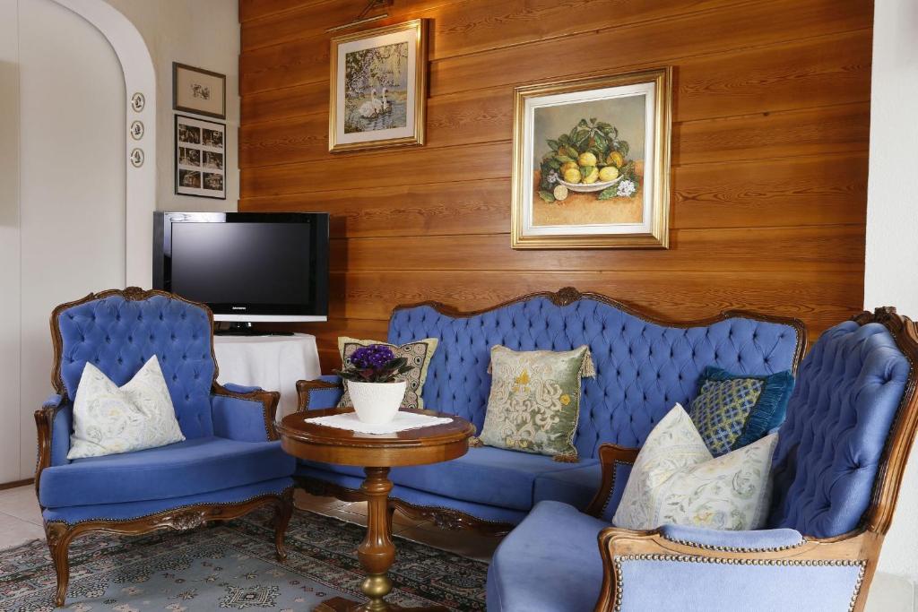 TV a/nebo společenská místnost v ubytování Hotel Tiffany